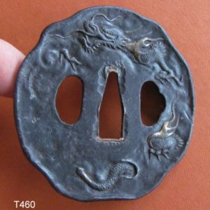 T460. Large Iron Tsuba with Fearsome Dragon