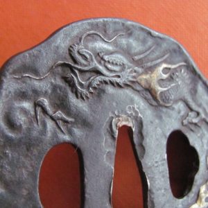 T460. Large Iron Tsuba with Fearsome Dragon