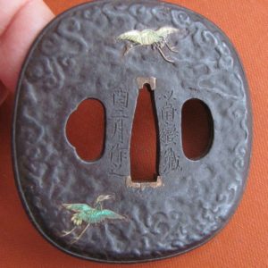 J142. Iron Tsuba by Myochin Munesuke with Hirada School Cloi…