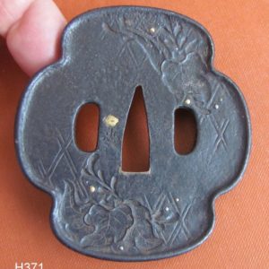 H371. Iron Tsuba signed Umetada. Holbrook