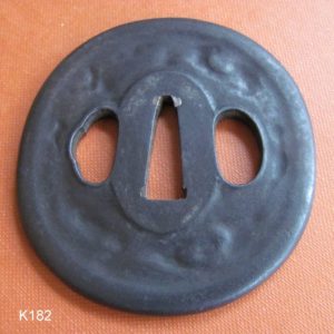 K182. Iron Tsuba with Soft, Melted Surface