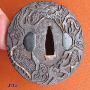 J115. Signed Jakushi Tsuba. Quite nice.