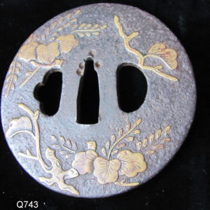 Q743. Iron Tsuba with Extensive Brass Inlay